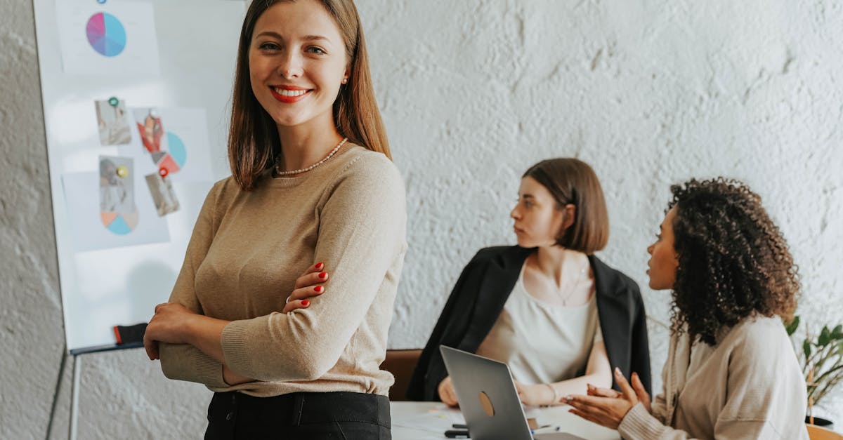 Entrepreneurship: Confident woman smiling in a modern office setting
